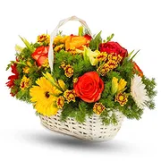 Østenden Online blomsterbutikk - Kurvsammensetning i gule nyanser og eller Bukett