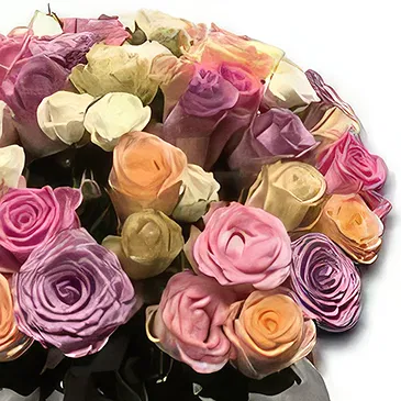 Yli blomster- Pastell perfeksjon Blomsterarrangementer bukett