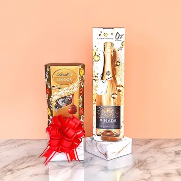 Frankfurt-virágok- Alkoholmentes Chardonnay és Lindt pralinék Virágkötészeti csokor