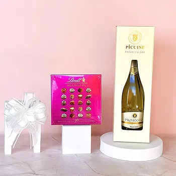 Riga-virágok- Prosecco és Lindt Bonbonok Virág Szállítás