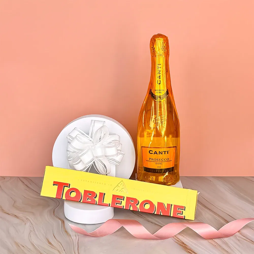 Burgos çiçek- Prosseco ve XL Toblerone İsviçre çikolatası