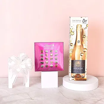 Riga-virágok- Alkoholmentes Chardonay és 20 Lindt szarvasgo Virág Szállítás