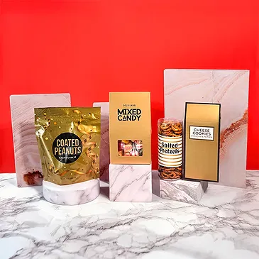 Alle andre byer blomster- Deluxe Snack Moments-gaveeske Blomsterarrangementer bukett