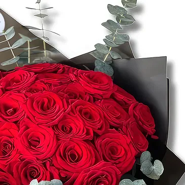 Al Shamkha flowers  -  Classic Red Roses in Black Wrapping Flower Bouquet/Arrangement