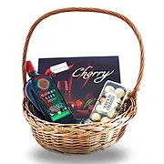 Bar Online cvećare - Горки листа и корпа са чоколадним посластицам Buket