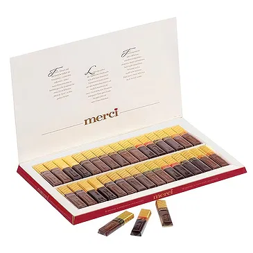 Flamberg bloemen bloemist- Italiaanse rode en Merci lentechocolade Boeket/bloemstuk