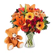 florens Online Florist - Bukett med orange blommor och mjuka leksaker Bukett
