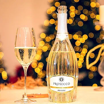 Riga-virágok- Prosecco és Lindt XL csokoládé szelet Virágkötészeti csokor