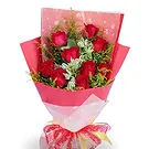 China flowers  -  Vibrant Red Roses Hand Bouquet in Red Package Flower Bouquet/Arrangement