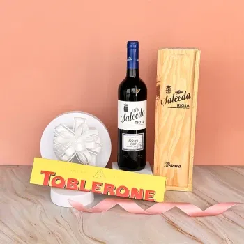 อิตาลี ดอกไม้ออนไลน์ - ช็อกโกแลตสวิส Toblerone สีแดงสเปนและ XL ช่อ