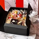 Alle andre byer blomster- Eske med sjokolade Blomsterarrangementer bukett